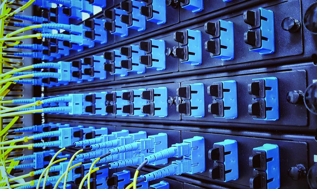 Rows of server racks inside a data center